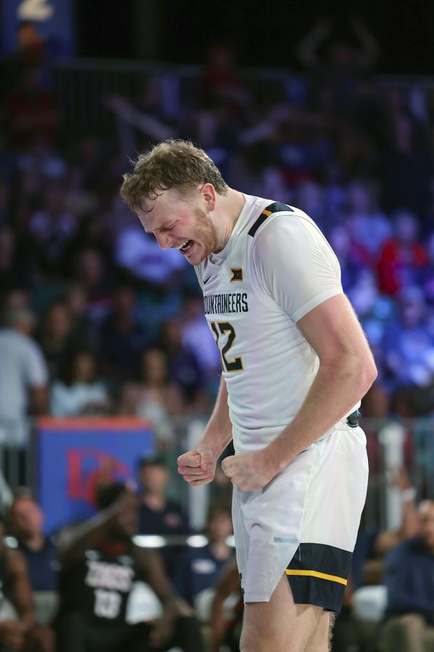 Javon Small, Tucker DeVries lead West Virginia to 73-60 victory over Georgetown